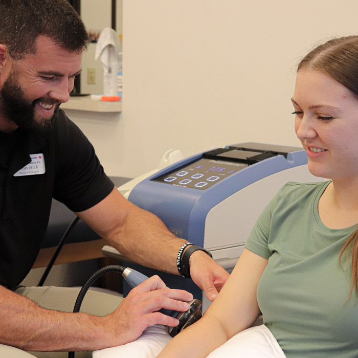 physical therapy giving tests to patient